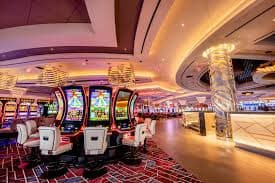 Ganesha Gold slot game interface di fantasyslot88 dengan gulungan dan simbol mitologi
